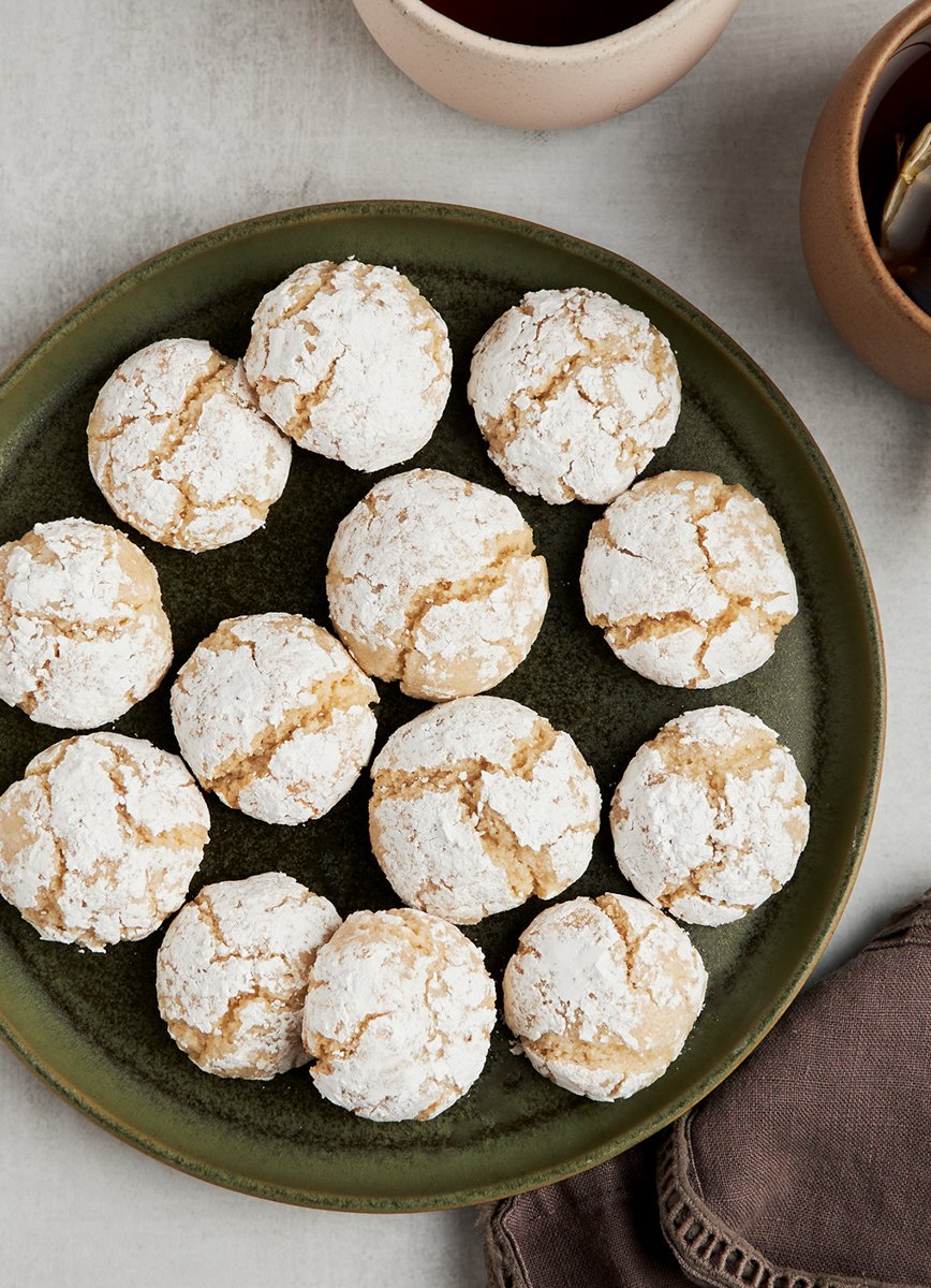 Almond cookies on plate with tea