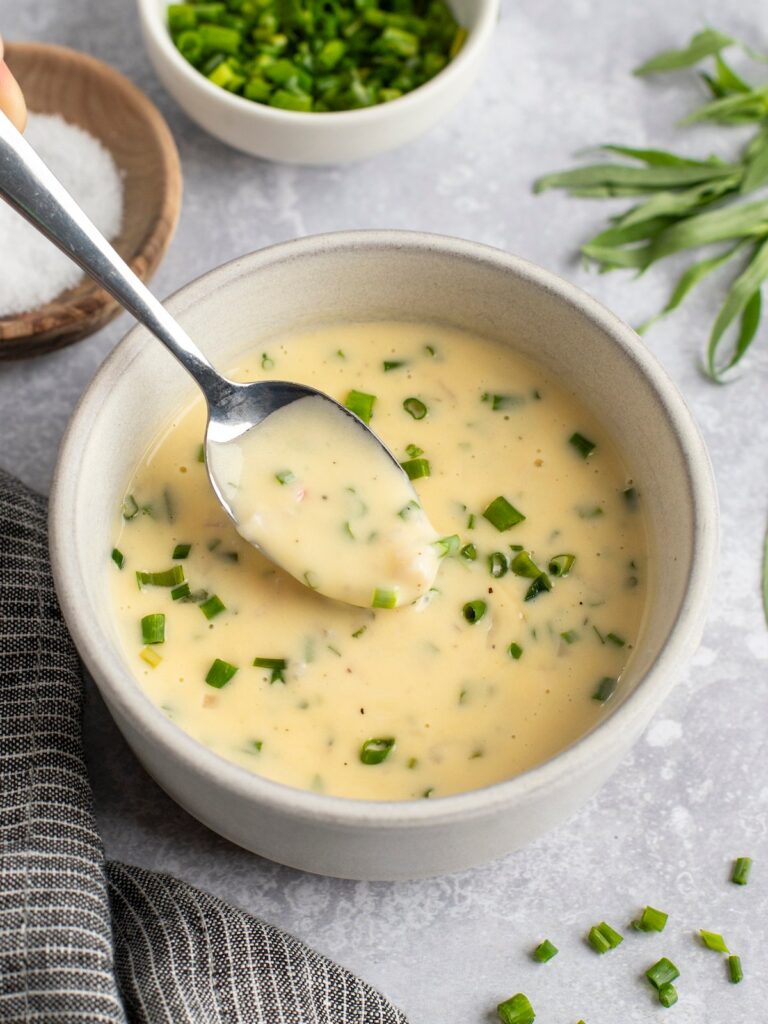 beurre blanc in bowl with spoon