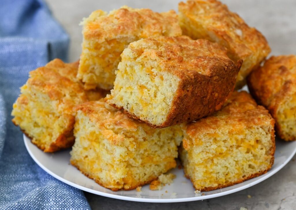 slices of irish cheddar soda bread on a plate.