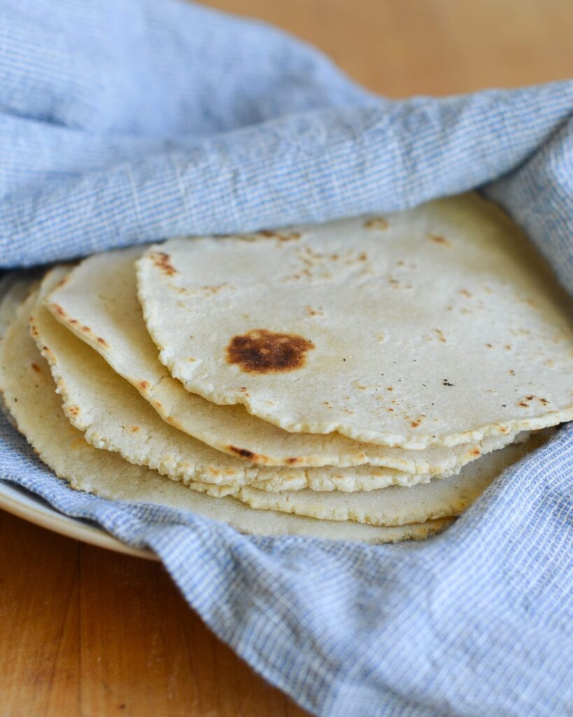 stack of homemade corn tortillas.